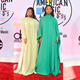 Illustration for article titled Statement Suits, Plush Pinks, and a Lotta Gowns on the American Music Awards Red Carpet